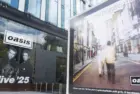 Oasis album cover artwork on display outside the Oasis live 25 shop in Manchester Manchester^ UK - 26 June 2025