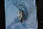 Vinyl cover art of Eagles Their Greatest Hits 1971-1975^ featuring rock music.