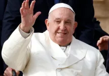 Pope Francis waves to the faithful at the end of his weekly general audience in St. PeterÕs Square at the Vatican^ November 13^ 2024.