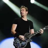 Chad Kroeger^ lead vocalist of the Canadian band Nickelback^ performs during the Rock in Rio 2013 concert^ on September 20^ 2013 in Rio de Janeiro^ Brazil.