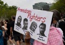 Demonstrators gather during a protest in front of the White House in Washington^ DC^ on April 19^ 2025.