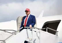 U.S. President Donald Trump arrives at Morristown Airport^ New Jersey^ on June 20^ 2025^ stepping off Air Force One en route to his Bedminster golf resort for a MAGA Inc. fundraising dinner.