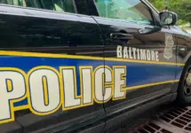 Baltimore Maryland police department sign on police cruiser BALTIMORE^ MARYLAND - JULY 29^ 2023