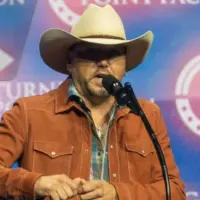 Jason Aldean speaks at a Donald Trump election rally at the Gas South Arena in Duluth^ Georgia. Duluth^ Georgia^ October 23^ 2024