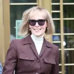 E. Jean Carroll smiles as she leaves the courtroom after a jury found former President Trump liable for sexual abuse and defamation. New York^ NY USA - May 9 2023