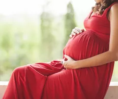 image-of-pregnant-woman-touching-her-belly-with-hands