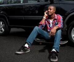 skateboarding-guy-talking-on-the-phone