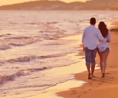 young-couple-on-beach-have-fun