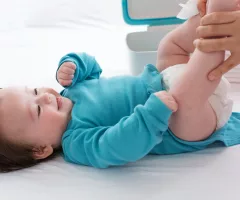 baby-boy-being-cared-for-by-his-mother