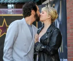 getty_joshgrobanandnataliemcqueenkiss_050726286482