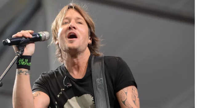 Keith Urban performs at the 2015 New Orleans Jazz and Heritage Festival. New Orleans^ LA - April 24^ 2015