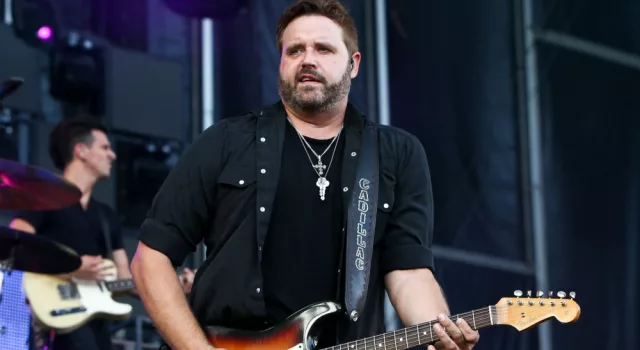 Randy Houser performs during Luke Bryan's 'Kick The Dust Up' Tour at Vanderbilt Stadium on July 11^ 2015 in Nashville^ Tennessee.
