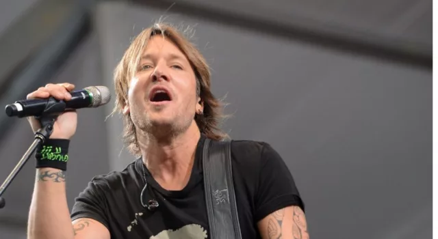 Keith Urban performs at the 2015 New Orleans Jazz and Heritage Festival. New Orleans^ LA - April 24^ 2015