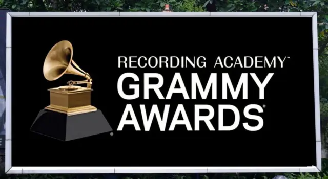 RECORDING ACADEMY^ GRAMMY AWARDS simply known as GRAMMY advertising seen on billboard