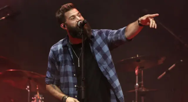 Jordan Davis performs at CMT's RAMJAM on June 3^ 2019 at TopGolf in Nashville^ Tennessee.