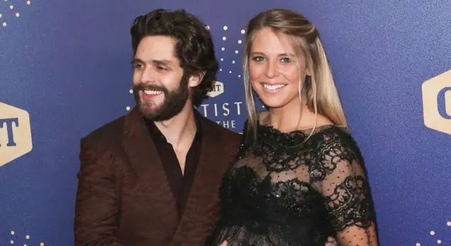 Thomas Rhett (L) and wife Lauren Akins attend the 2019 CMT Artists of the Year at Schermerhorn Symphony Center on October 16^ 2019 in Nashville^ Tennessee.