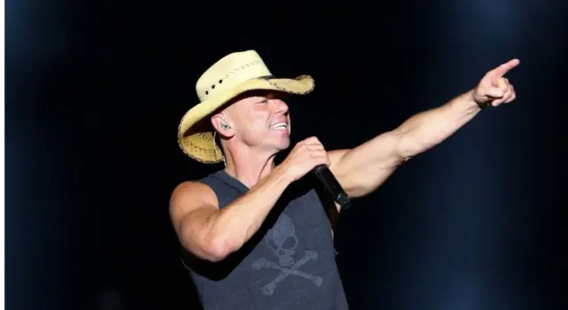 Singer Kenny Chesney performs onstage at the Runaway Country Music Fest at Osceola Heritage Park on March 19^ 2016 in Kissimmee^ Florida.