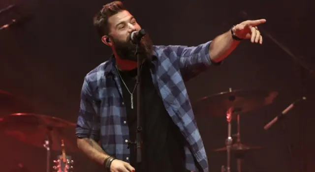 Jordan Davis performs at CMT's RAMJAM on June 3^ 2019 at TopGolf in Nashville^ Tennessee. NASHVILLE^ TN - JUN 3: