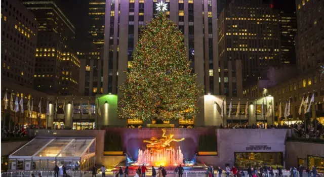 Ice skaters fill the skating rink under the Rockefeller Center Christmas tree^ a popular holiday tourist attraction in Midtown Manhattan.NEW YORK CITY - DECEMBER 10^ 2015