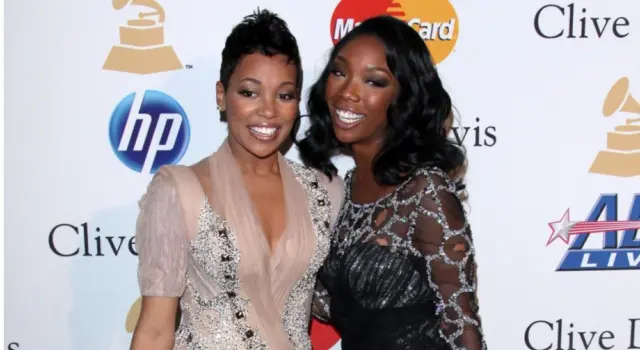 Monica^ Brandy Norwood arrives at the 2011 Pre-GRAMMY Gala And Salute To Industry Icons at Beverly Hilton Hotel on February 12^ 2011 in Beverly Hills^ CA