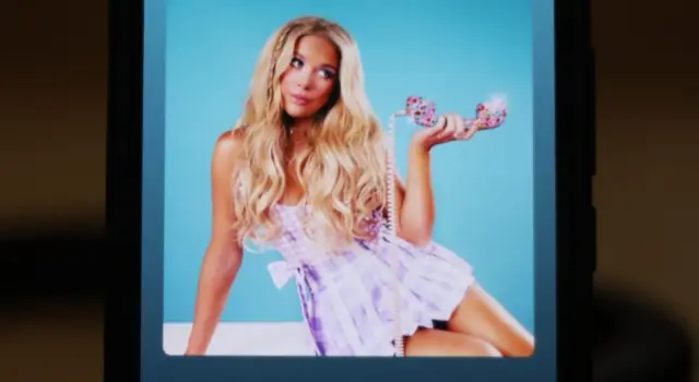 Image shows the album cover and Spotify playback screen displayed on a phone for the song "6 Months Later" by country music artist Megan Moroney.