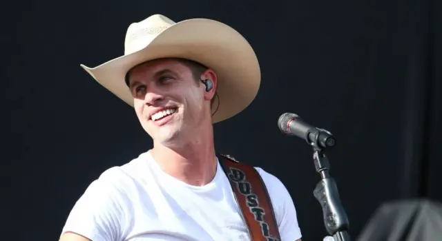 Country recording artist Dustin Lynch performs during the 'Kick The Dust Up' Tour at Vanderbilt Stadium on July 11^ 2015 in Nashville^ Tennessee.