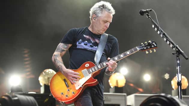 Mike McCready of Pearl Jam performs the National Anthem at T