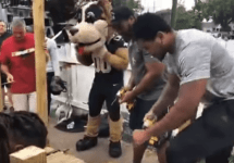 saints-players-with-mascot-build-ramp-png-2