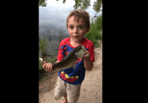 kid-holding-fish-png