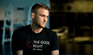 dustin-poirier-with-the-good-fight-shirt-png