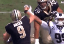 brees-hits-hand-against-aaron-donalds-hand-png-5