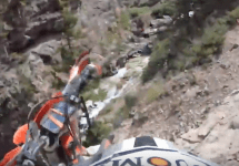 motorcyclist falls from cliff
