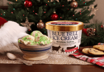 blue-bell-christmas-cookies-ice-cream-on-display-with-santas-hand-png-2