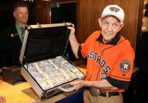 mattress-mack-in-astros-jerseyplacing-bet-with-brief-case-of-millions-png