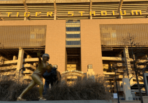 student-poses-as-heisman-trophy-on-lsu-campus