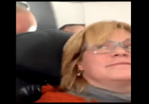 woman-looking-backwards-in-airplane-png