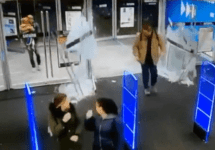 man-walks-in-store-and-shatters-glass-doors-png
