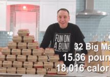 joey-chestnut-with-stacks-of-big-macs-png