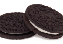 two oreo cookies on a white background