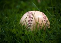 one-aged-and-worn-baseball-sitting-in-the-green-grass_rtmvpdrss-jpg-4