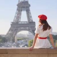 abeautifulgirlinawhitedressaredberet