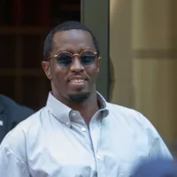 Sean “Diddy” Combs exiting the Crosby Street Hotel and heading to a waiting line of black SUV's. Lower Manhattan NYC^ New York / USA - July 24^ 2019