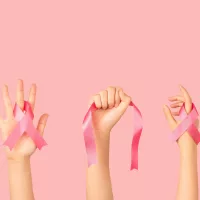 breastcancerawarenessmonthinoctober-groupofwomenhands