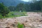 Flash floods that hit the lower plains with water mixed with mud