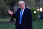 President Donald Trump walks across the south lawn after stepping off Marine 1 Washington DC^ United States^ April 6 2025