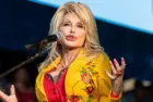 Dolly Parton performs at The Newport Folk Festival in Rhode Island. Newport^ Rhode Island^ USA - July 27^2019
