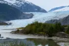 Tourist visiting Mendenhall Glacier. Juneau. Alaska.