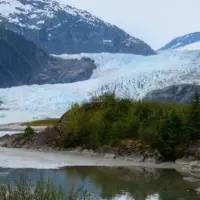 Tourist visiting Mendenhall Glacier. Juneau. Alaska.