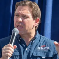 Florida Republican Governor and presidential candidate Ron DeSantis greets supporters at the Iowa State Fair fair side chats in Des Moines^ Iowa. Des Moines^ Iowa^ USA - August 12^ 2023