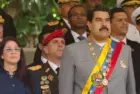 President of Venezuela^ Nicolás Maduro with First Lady Cilia Flores in a military parade. Caracas. February 1^ 2017